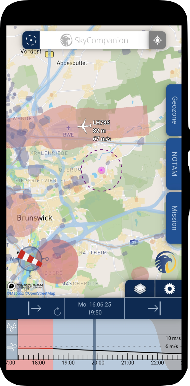 Smartphone with screenshot of app SkyCompanion showing a map with air traffic and geo-zones as well as a time slider element with weather data