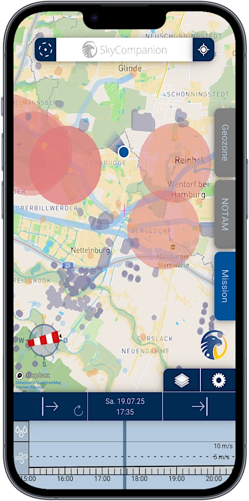 Smartphone with screenshot of app SkyCompanion showing a map with geo-zones and a time slider element with weather data